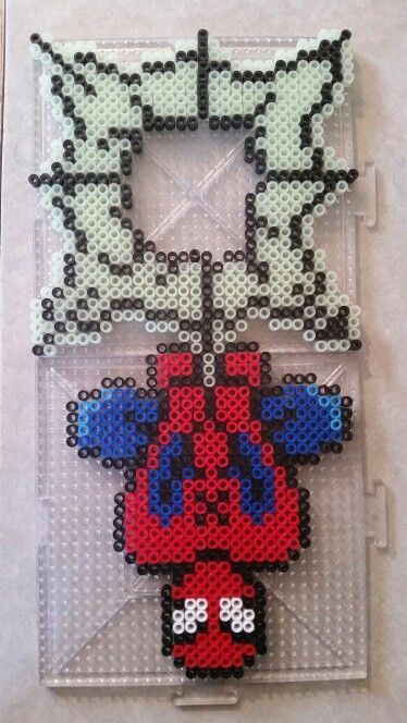 Spiderman door hanger made from Perler beads Peeler Bead Spiderman, Spiderman Beads Pattern, Marvel Beads Pattern, Pearler Bead Door Hanger, Pixel Art Door Hanger, Peeler Bead Door Hanger, Perler Door Hanger, Avengers Perler Beads, Perler Bead Door Hanger