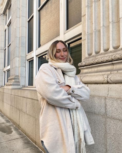 influencer wearing white chunky scarf styled with cream colored Aritzia shacket standing in front of a neutral city building with historic architectural style Shacket And Scarf Outfit, Instagram Content Ideas Lifestyle, Content Ideas Lifestyle, Minimalist Winter Outfits, Winter Outfits Minimalist, Lifestyle Content Ideas, Chunky Scarf Outfit, Monochromatic Outfit Ideas, Fashion Content Ideas