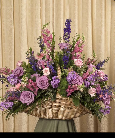 Pastel garden selection includes roses and snapdragons, stands 20" tall and arrives in a handwoven fireside basket.  PURPLE ROSE PINK SNAP Flower Basket Ideas, Basket Flower Arrangements, Altar Flowers, Gubahan Bunga, Large Flower Arrangements, Gerbera Daisies, Church Flower Arrangements, Creative Flower Arrangements, Church Flowers