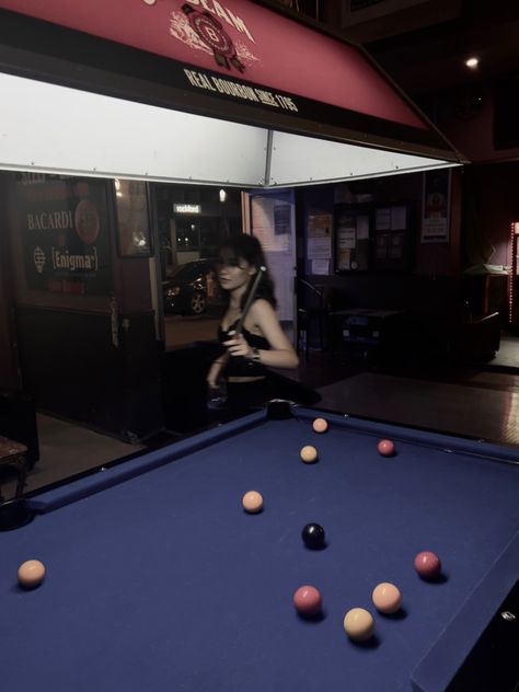 standing behind a pool table holding a cue Playing Pool Aesthetic, Grunge Bar, Pool Table Photoshoot, Big Bear Trip, Billiards Aesthetic, Playing Pool, Couple Laughing, Beautiful Scotland, Vintage Photoshoot