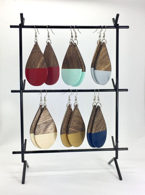 Introducing our exquisite Wood Teardrop Shaped Earrings, adorned with a captivating dip paint effect, with a gorgeous dark walnut wood stain. These handcrafted earrings are a harmonious blend of nature's beauty and artistic flair, designed to add a touch of elegance to your ensemble. Each teardrop earring is laser cut from wood, ensuring a lightweight and comfortable wear throughout the day. The graceful teardrop shape is a timeless symbol of emotion and grace, making these earrings not only a f Crystal Point Jewelry, Lotus Flower Jewelry, Wooden Jewelery, Earring Simple, Wood Earring, Laser Cut Jewelry, Amethyst Studs, Hoop Earrings Silver, Hammered Hoop Earrings