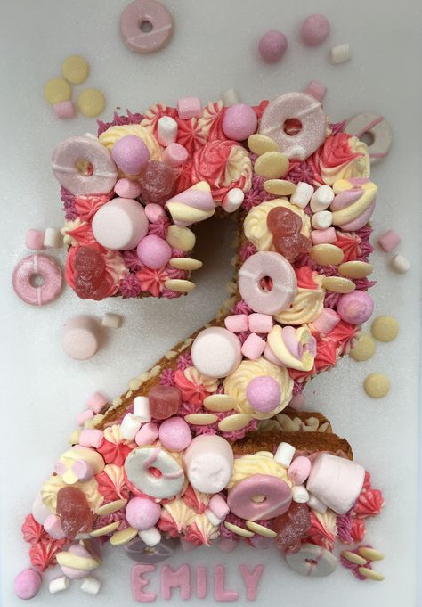 Number 2 shaped birthday cake decorated with a selection of pink and white chocolates, sweets and biscuits Sweets Birthday, Pink Sweets, Cake Party, Number Cake, Girl 2nd Birthday, Candy Cake, Number Cakes, Special Cake, Birthday Ring