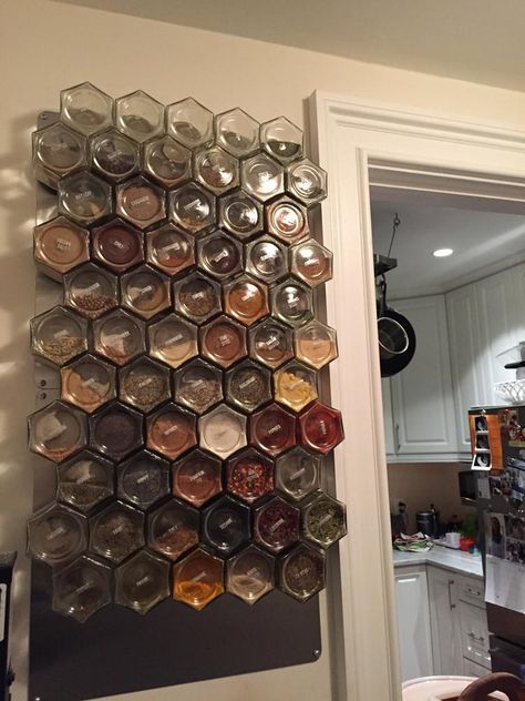 Store jars on your backsplash, cupboard or inside a cabinet! DIY Magnetic Wall Spice Rack includes: 24 large hexagon magnetic Empty jars to fill with spices from your pantry Strong magnets to keep jars from sliding Air tight silver lids keep spices fresh Internal barrier between magnet and spices Clear labels of most common spice names Your choice of wall plate size Jars are empty, to fill with herbs and spices from your pantry. Large jars measure 2.5” x 2.5” and hold a heaping 1/2 c volume. Lar