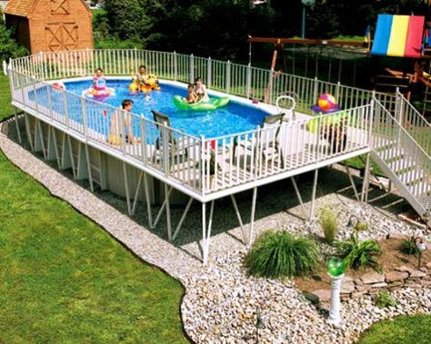 Large backyards like this one are great for family-oriented activity areas and structures like an above-ground pool, playhouse and swing set. Johnny Weissmuller, Swimming Pool Decorations, Pool Deck Plans, Large Backyard Landscaping, Best Above Ground Pool, Above Ground Pools, Above Ground Pool Landscaping, Above Ground Pool Decks, Ground Pools