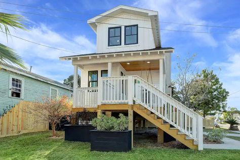 Cottage On Stilts, Tiny Beach House, Mini Loft, Tiny House Talk, Tiny Houses For Rent, Custom Canopy, Outdoor Lounge Area, House On Stilts, Tiny Cottage