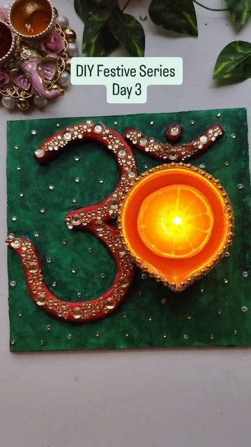 Megha Atul Deshmukh on Instagram: "OM Diya holder , perfect DIY to decorate Rangoli or any corner of your home during the festive season.

Comment 💚 if you like this DIY.

Materials:
Cardboard 
Acrylic paint 
Clay 
Artificial lace n diya

(Budget friendly festive decor, Diya decor, handcrafted Indian art , art reel, easy DIY, explore page, festive decor, Om Diya holder , Diwali decor , handmade decor , handmade Diwali decor )

#diyfestivedecor
#diy #festivevibes
#festiveseries #easydiy #diydiyaholder #indianfestivedecor #budgetfriendlydiy #diwalidecor #diwalidecorations #navratri2024 #diyadecoration #diyadecor #festivaldecoration #festivevibes" Acrylic Rangoli, Diwali Decorations, Diwali, Handmade Decorations, Indian Art, Festival Decorations, Budget Friendly, Festival Season, Easy Diy