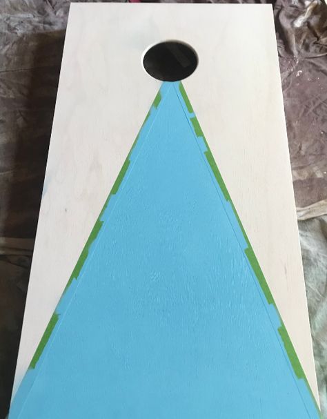 How to custom paint your own cornhole game! Easy steps to decorate your cornhole game for fun at parties, events, fundraisers or backyard play! #cornhole #howto #DIY | Poplolly Co Painting Cornhole Boards, Cornhole Board Dimensions, Painted Corn Hole Boards, Stained Cornhole Boards, Diy Cornhole Boards, Corn Hole Diy, Cornhole Designs, Cornhole Decals, Games For Fun