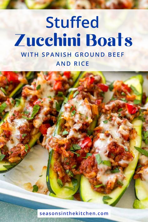 Charm the whole family with our Stuffed Zucchini Boats filled with Spanish Ground Beef and Rice. This easy-to-follow recipe combines wholesome ingredients with a hint of Spanish flair, creating a nutritious and delightful meal. Elevate your dinner game with this crowd-pleasing dish! Ground Beef Zucchini Boats, Beef Zucchini Boats, Lighter Recipes, Ground Beef And Rice, Stuffed Zucchini Boats, Ground Beef Rice, Hearty Beef Stew, Beef Rice, Stuffed Zucchini