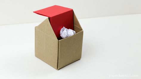 Learn how to make a cute origami rubbish box for your desk!  This origami garbage bin also looks like an origami house.. ♥ Origami House, Pretty Origami, Origami Templates, Box Origami, Paper Kawaii, Dollar Origami, Origami Boxes, Origami Ball, Dollar Bill Origami