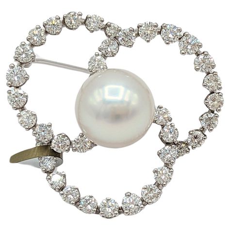 Gorgeous estate Tiffany & Company brooch featuring a big white round pearl and good quality white diamond rounds. Handmade in platinum. Comes with original bag. Haute Jewelry, Diamond Brooch, Tiffany And Co, Original Bags, Pearl Diamond, White Pearl, Tiffany & Co., White Diamond, Pearl White