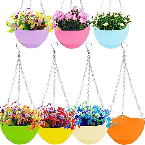 These colorful hanging planters will brighten up your outdoor or indoor spaces. #gardenideas #prettygardenideas #windchimes #fairycore #patioideas #backyardideas #outdoor #plants #gardenvibes #fairyvibes #cutegardenideas #cutebackyard #DIYprivacy *This is an affiliate marketing product reccommendation. Plastic Hanging Planters, Amy White, Garden Planters Pots, Plants Pots, Outdoor Garden Planters, Macrame Planter, Self Watering Pots, Hanging Flower Pots, Flower Plants