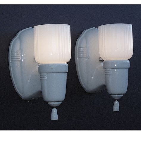 These vintage bathroom or vintage kitchen wall lighting sconces are classic 1920s -1930s decor. White porcelain lamps with period white shades  http://www.vintagelights.com/product/4/vintage-white-porcelain-bathroom-kitchen-sconces-with-period-shades.html Vintage Bathroom Light Fixtures, 1920s Bathroom, Vintage Bathroom Lighting, Bathroom Lighting Sconces, Best Bathroom Lighting, Kitchen Wall Lights, Lighting Sconces, Vintage Light Fixtures, Bathroom Sconces