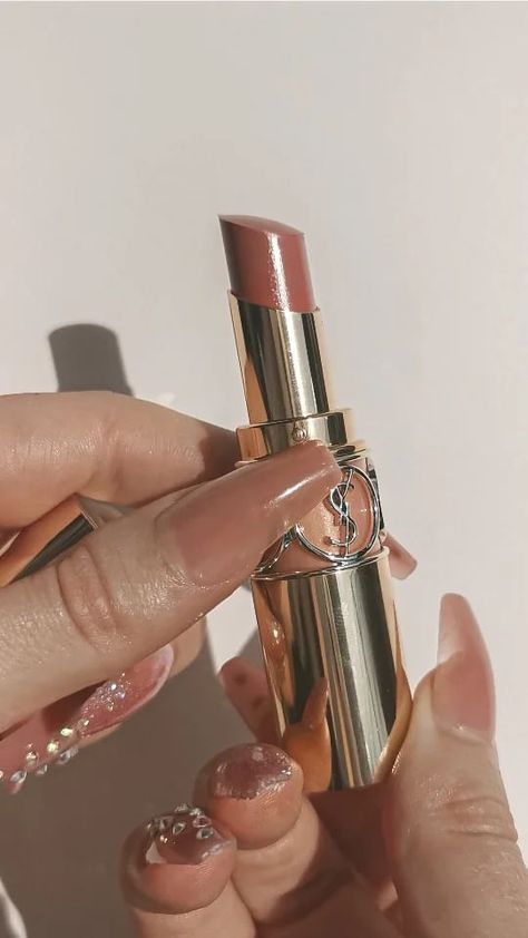 Am I the only one? 💄✨@yslbeauty Rouge Volupté Shine Lipstick Balm

✨color 44 Nude Lavalliere
✨hydrating lipstick balm with 65 % oils 
✨medium coverage & glossy finish

Been looking at these lipsticks for 10 years and finally got one. Actually I got a YSL pouch with a set of 3. Want to see the rest?
.
.
.
.
.
.
.
.
#ysl #yvessaintlaurent #yslbeauty #ysllipstick #rougevolupte #luxurymakeup #luxurybeauty #nudeaesthetic #nudelipstick #aesthetically #parisien #parisienne #parisiennestyle #howtobepar Ysl Lipstick Balm, Ysl Lipstick Aesthetic, Ysl Vibes, Ysl Makeup Lipstick, Yves Saint Laurent Aesthetic, Ysl Pouch, Saint Laurent Aesthetic, Lipstick Aesthetic, Ysl Rouge Volupte Shine