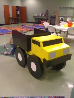 how to make a dump truck out of cardboard | Feather Fancy Dump Truck Party, Cardboard Box Car, Dump Truck Birthday, Construction Theme Birthday Party, Cardboard Car, Construction Theme Party, Truck Diy, Vbs Themes, Imagination Station