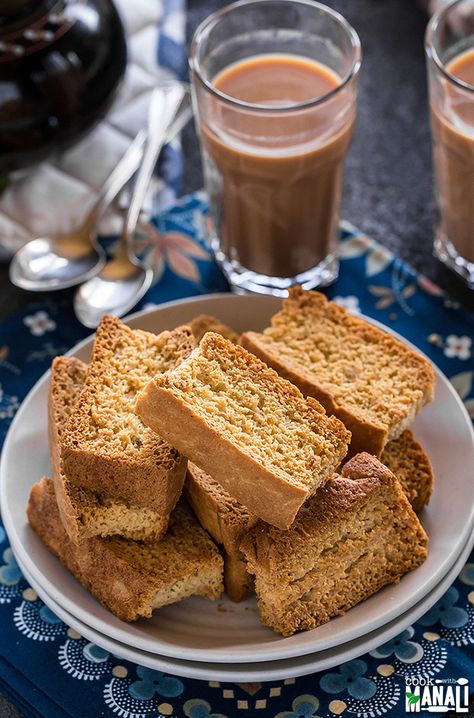 Crispy twice baked toasts, rusks are best enjoy with chai! Find the recipe on www.cookwithmanali.com Tea Rusk Recipe, Cake Rusk Recipe, Rusk Recipe, Eggless Baking, Toasted Bread, Indian Snack Recipes, Snacks Recipes, Recipe Video, Vegan Cake