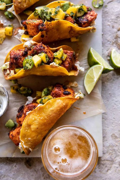 Crispy BBQ Salmon Tacos with Avocado Mango Salsa and Jalapeño Cream | halfbakedharvest.com Half Baked Harvest Fish Tacos, Slow Cooker Recipes Fish, Salmon Taco Recipes, Mexican Bbq, Bbq Tacos, Grilled Chicken Wraps, Tacos With Avocado, Half Baked Harvest Recipes, Bbq Salmon