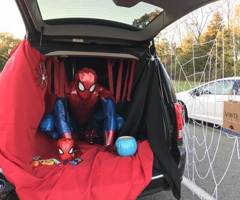 Spider-Man trunk or treat - thanks to another Pinterest post giving me the idea. Easy- and won us 2nd place! :) Marvel Trunk Or Treat Ideas For Cars, Spider Man Trunk Or Treat Ideas For Cars, Spiderman Trunk Or Treat Ideas For Cars, Superhero Trunk Or Treat Ideas For Cars, Trunk Or Treat Spiderman, Marvel Trunk Or Treat, Spider Man Trunk Or Treat, Marvel Trunk Or Treat Ideas, Spiderman Trunk Or Treat