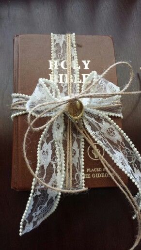 Using this in place of a traditional ring bearer pillow. Inexpensive alternative if you have a favorite book or bible at home. Ring Bearer Pillow Alternative Unique, Ring Carrier Ideas Wedding, Ring Bearer Bible, Bible Ring Bearer, Ring Bearer Carrying Ideas, Diy Ring Bearer Pillow, Ring Bearer Alternative Ideas, Wedding Ring Pillow Alternative, Ring Bearer Ideas