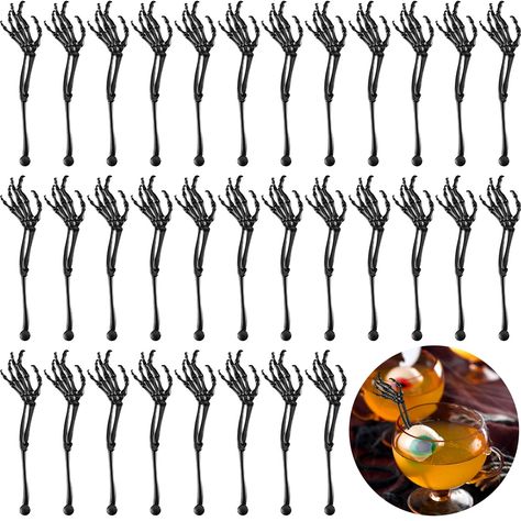 PRICES MAY VARY. Sufficient Quantity: you will receive 100 pieces of about 4.7 inch skeleton hands swizzle sticks, designed with skeletal arms detail, conveniently catering to your party decoration requirements without raising the need, spicing up your next social gathering with these accessories Distinctive Style: presenting a creative take on cocktail mixes, our Halloween drink stirrer models an intricate skeleton arm design, with the spooky black color enhancing the spooky atmosphere, strikin Cocktail Decorations, Halloween Drinks Alcohol, Cocktail Stirrers, Cocktail Decoration, Halloween Outside, Halloween Party Decorations, Coffee Stirrers, Birthday Bar, Cocktail Garnish