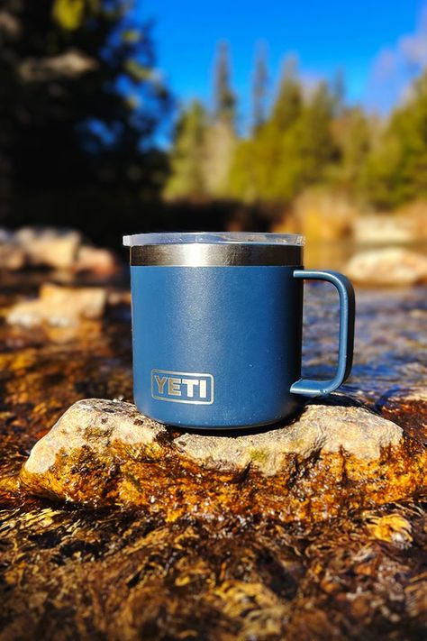 YETI Rambler mug sitting on a rock in the river. Yeti Mug, Camping Gear List, Best Camping Gear, Yeti Rambler, Toy Story Party, Natural Branding, Adventure Gear, Camping Supplies, Wilderness Survival