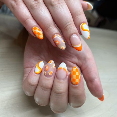 #orange #orangenails #nails #nailsofinstagram #nailsdesign #sunmernails #summernails #summervibes #coatednailsohio #ohiosalons #ohio #nailsoftheday #nailtrends #checkered Cute Orange Nails Design, Short Acrylic Nails Square Checkered, Retro Checkered Nails, Cute Nails Checkered, Orange And White Checkerboard Nails, Orange Retro Nails, Mismatched Nail Designs, Wavy Checkered Nails, Orange Checkered Nails