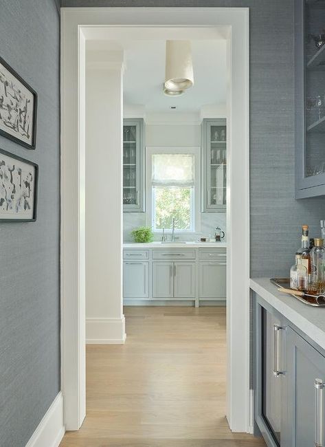 Blue Grasscloth Wallpaper, Blue Grasscloth, Blue Shaker Cabinets, Black Quartz Countertops, Herringbone Tile Backsplash, White Pantry, Marble Herringbone, Lucite Furniture, Pantry Cabinets