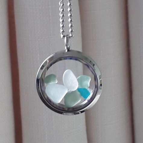 Genuine Seaham Sea Glass Floating Locket from the Seaham coast in north east England.  Handpicked by me and carefully chosen for it's smoothness.  A unique gift for a beach lover and you can choose from coastal colours or garden colours. Each locket will have different colours and sizes of glass due to it's original form but as close as possible to the examples shown. The locket is made from stainless steel which is very kind to your skin with a stainless steel 18 inch chain  Carry the beach clo Coastal Colours, Beach Glass Necklace, Coastal Colors, Glass Locket, Jewellery Unique, Floating Lockets, Glass Jewellery, Unique Beach, Beach Lover