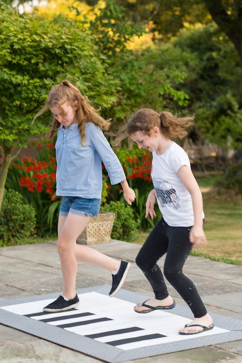 two girls playing on a giant floor piano in a park Floor Piano, Outdoor Music, Playset Outdoor, School Playground, Park Playground, Musical Plays, Outdoor Classroom, Indoor Play, Playground Equipment