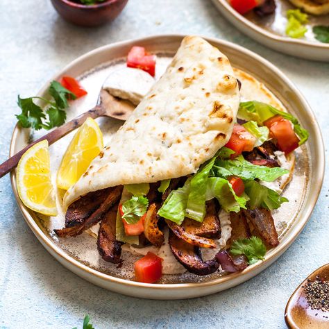 Mushroom Shawarma with Yogurt-Tahini Sauce Mushroom Shawarma, Arabisk Mad, Tahini Sauce Recipe, Shawarma Recipe, Vegetarian Dinners, Tahini Sauce, Yogurt Sauce, Vegetarian Dinner, It Goes On