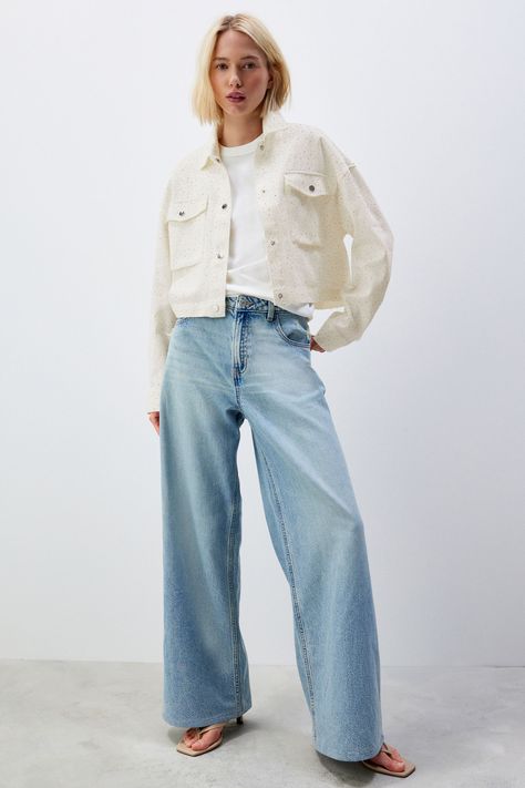 With a cropped boxy-fit, this Western-inspired cotton denim jacket features a button-up fastening, a classic collar and large flap pockets to the chest, finished with rhinestone detailing. Regular centre back neck to hem 19" / 48cm. Washable. 100% Cotton. Off White Denim Jacket Outfit, Outfits With White Denim Jacket, White Denim Jacket Outfit Aesthetic, White Denim Jacket Outfit, Denim Jacket Outfit Women, Cropped Denim Jacket Outfit, Cropped Jacket Outfit, Singapore Outfit, Rhinestone Jacket