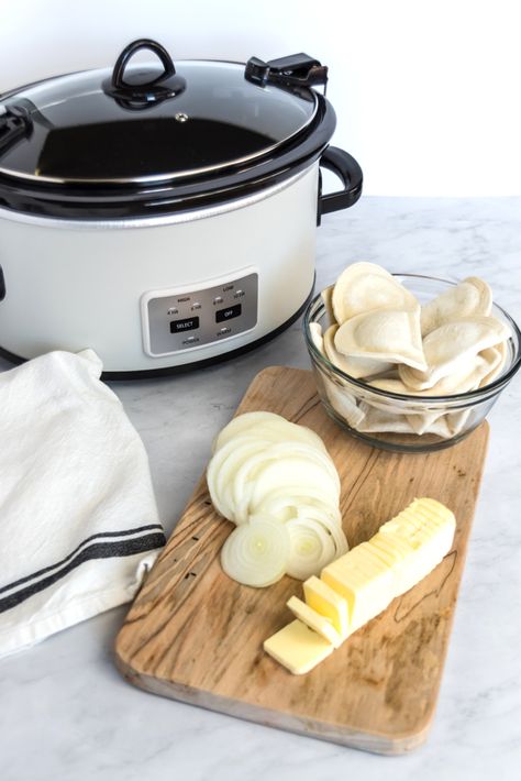 Crock Pot Pierogi with Butter and Onions | It is a Keeper Perogies Recipe Frozen Crockpot, Perogies For A Crowd, Crock Pot Pierogies, Frozen Pierogies In Crockpot, Pierogies In Crockpot, Perogies In Crockpot, Crock Pot Perogies, Slow Cooker Perogies, Crockpot Perogies Recipe