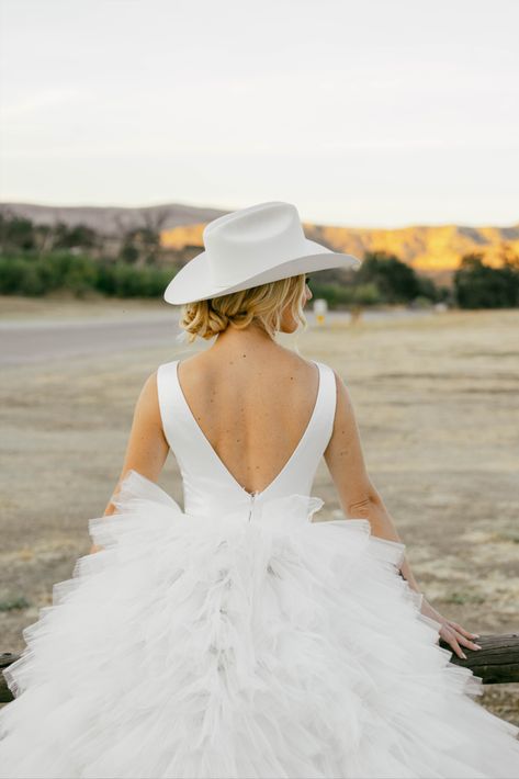 City Boot cowboy boots ross wedding dress rita vinieris Authentic fun candid wedding photography Artistic wedding photography Western bridal designs with ruffles fashion photography bridal portraits bridal western aesthetic editorial bridal portraits bride photos wedding dress dream wedding nature editorial bride engaged stetson cowboy hat wedding black and white photographer photo by @Kristakphotos Bride With Cowboy Hat, Western Wedding Aesthetic, Cowboy Hat Wedding, Photoshoot Western, Nature Editorial, Aesthetic Editorial, Aesthetic Bride, Editorial Bride, Bridal Aesthetic