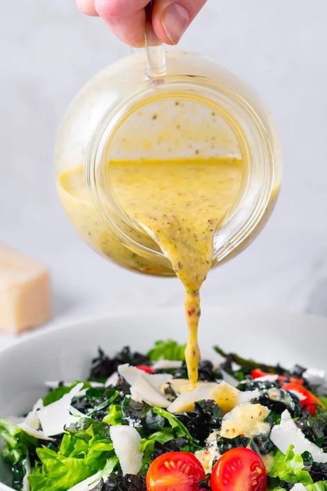 You must try this garlic parmesan vinaigrette dressing if you're a fan of tangy, cheesy, zesty dressings! Homemade parmesan vinaigrette will make you never go back to store-bought and wondering why you never made homemade dressings before. This is a great salad dressing for nearly any salad recipe and I hope you give it a try. Parmesan Vinaigrette Dressing, Easy Sauce Recipe, Homemade Dressings, Salad Dressing Recipes Homemade, Homemade Condiments, Small Food Processor, Vinaigrette Recipes, Vinaigrette Dressing, Homemade Salad Dressing