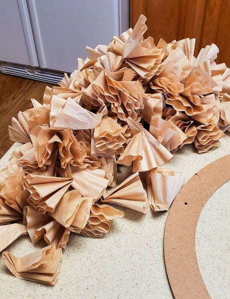 These days, you can create a wreath with anything! Paper coffee filters are no exception!I've see pretty wreaths like this in boutique shops and such. I loved them; but not the price! I figured I could easily make something similar, and much more cost effective! Below, I'm going to show you how to make one in just a few easy steps! Supplies You will need a wreath form of your choice, coffee filters, and a hot glue gun.I used a cardboard wreath, I found at the Goodwill; along with free… Cardboard Wreath, Concrete Bird Bath, Coffee Filter Wreath, Twig Lights, Straw Wreath, Mosaic Flower Pots, Spring Coffee, Diy Entryway, Diy Plant Stand