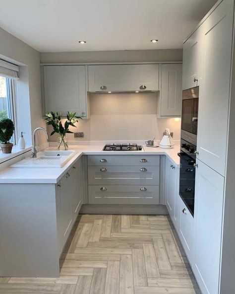 Kitchen goals 😍 We're obsessed with the classy and modern vibe our herringbone flooring gives to @amybates93 kitchen 🤍✨ Don't forget to tag us in your home transformations, we love to see them! 🫶 #wooltoncarpetcentre #flooringinspo #hometransformation #liverpoolflooring Fitted Kitchen Ideas Modern, Howdens Dove Grey Kitchen, Howdens Bridgemere, Howdens Elmbridge Kitchen, Howdens Pebble Kitchen, Elmbridge Howdens, Kitchen Colours 2024, Howdens Kitchen Shaker, Shaker Style Kitchens Grey