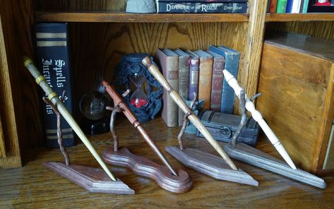 If you have a wand, you need a stand to display it properly. DragonAlleyWands on Etsy. Diy Wand Stand, Wand Holder Diy, Harry Potter Wand Stand, Harry Potter Wand Display, Wands Diy, Wand Stand, Wand Display, Harry Potter Wands, Wand Holder