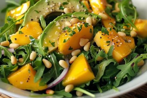 Avocado Mango Salad with Arugula, Pine Nuts, and Honey-Lime Dressing Avocado Mango Salad With Arugula, Mango Avocado Arugula Salad With Honey Lime Dressing, Honey Lime Dressing Recipe, Avocado Mango Salad, Lettuce Salad Recipes, Arugula Salad Recipes, Honey Lime Dressing, Yummy Salads, Mango Avocado