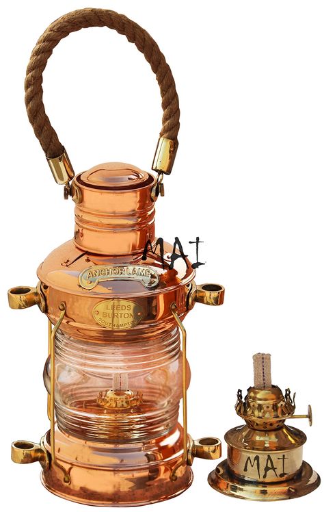 PRICES MAY VARY. Antique Brass & Copper Hurricane lanterns stand 14" tall with hanger SIZE :- 7.5 x 5.5 x 11.25 inch, 19 x 14 x 28.6 cm, weight 1.650 kg (Approx) Comes with oil burner inside with wick. A perfect blend of form and function our oil lamps add to any decor, as well as being fully operational for ambient and emergency lighting Description: Beautiful reproduction of anchor lantern made of brass in shiny brass look. Oil burner is in great working condition and produce clear light through. Solid glass Fresnel type lens. Total Height - 14 inches, 35.6 cm with hanger. Comes with oil burner inside with wick. Product Features: Material: Brass, Copper & Glass Finish: Shiny Brass & Copper Finish Weight: 1.650 kg SIZE :- 7.5 x 5.5 x 11.25 inch, 19 x 14 x 28.6 cm Look Photos For Actual Im Lantern Stand, How To Make Lanterns, Copper Glass, Oil Burner, Oil Lamp, Emergency Lighting, Oil Burners, Brass Copper, Copper Finish