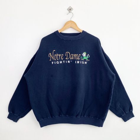 Vintage NCAA University of Notre Dame ‘Fighting Irish’ Crewneck Sweatshirt Embroidery Logo Blue Color Men’s XXL by OzzyVintageShop on Etsy Vintage College Sweatshirts, University Of Notre Dame, Sweatshirt Embroidery, Notre Dame University, College Sweatshirt, Embroidery Sweatshirt, Embroidery Logo, Notre Dame, Ncaa