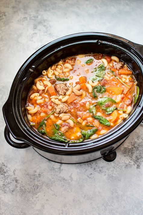 This Crockpot Italian sausage soup recipe is hearty, filling, and full of flavor. A wonderful and easy set it and forget it soup recipe. Sausage Soup Crockpot, Crockpot Italian Sausage, Italian Crockpot Recipes, Crockpot Italian, Quick Soup Recipes, Sausage Crockpot, Sausage Soup Recipes, Italian Sausage Soup, Italian Sausage Recipes