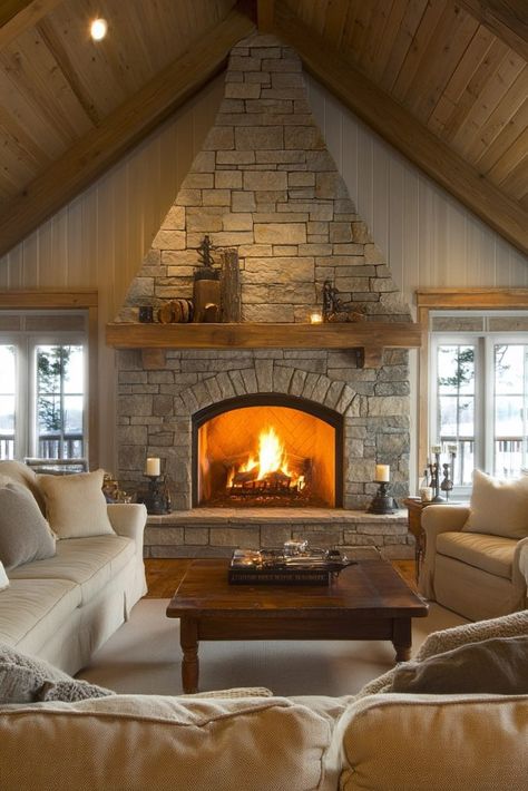 29 Rustic Living Room Ideas for a Cozy and Country-Inspired Look 12 Fireplace Rustic Modern, Arched Stone Fireplace, Brown Stone Fireplace, Stone Fireplace Vaulted Ceiling, Stone Fireplace Floor To Ceiling, Rustic Glam Living Room, Stone Fireplace Living Room, Lodge Fireplace, River Rock Fireplace