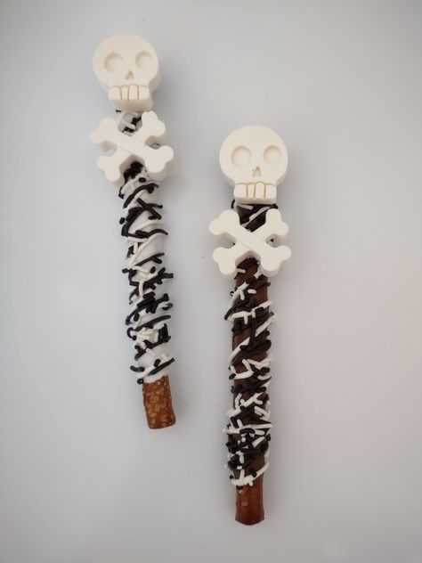 Skull & Cross Bones are sold by the dozen. Each individually wrapped and tied with a bow. Perfect for Halloween or a pirate themed party. Bad Two The Bone Food Ideas, Bad Two The Bone Cookies, Bad Two The Bone Cake, Bad Two The Bone Birthday Party Boy, Bone Cookies, Bad Two The Bone, Pirate Themed Party, Covered Pretzel Rods, Chocolate Covered Pretzel