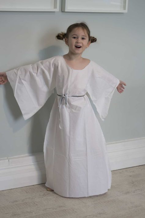 My girls love dressing up for World Book Day. They love reading and have lots of characters that they love and want to dress up as. This year Little Miss J is still really into Star Wars. Last year she went dressed up as Darth Vader and this year she wanted to be Princess Leia. I made her a really easy costume out of Simple Angel Costume, Diy Princess Leia Costume, Kids Angel Costume, Princess Leia Costume Diy, Princess Leia Dress, Angel Costume Diy, Princess Leia Costume, Nativity Costumes, Leia Costume