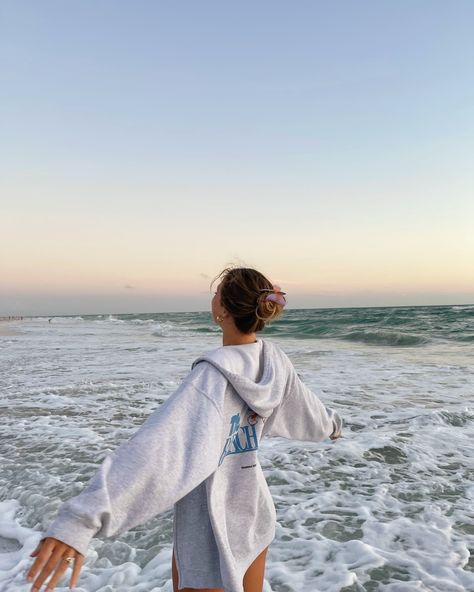 Keeping you cozy after those sunset swims☁️🌅 Our Thumbs Up Zip Sweatshirt + Logo Crewneck restock TOMORROW 11am est🫶🏼 The Beach Club, Beach Sweatshirt, Running On The Beach, Beach Photo, July 12, 2025 Vision, Beach Photos, Pose Ideas, Zip Sweatshirt