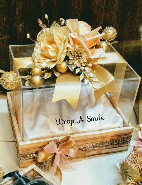 Our Pretty bridal acrylic Trousseau box! Super classy for gifting! Wood hampers with decor for cosmetics & accessories! 💝 In complete awwe of these! #trousseaupacking #acrylicbox #trays#weddingtrousseau #woodentrays #woodenplatters #floraldecor #acrylicboxes #floralboxes #trousseaupackingservices #luxurygifting ##bespokepackaging Acrylic Box Gift Hampers, Acrylic Gift Box Ideas, Acrylic Box Packaging, Acrylic Box Gift, Wood Hamper, Wooden Decoration Ideas, Wedding Hampers, Diy Projects For Adults, Wedding Gift Hampers