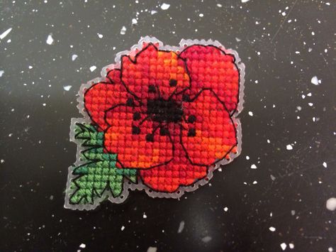 Cross stitch poppy brooch (idea & pattern from Cross Stitch Collection). Money donated to the Poppy Appeal :) Cross Stitch Poppy, Wedding Sampler Cross Stitch, Poppy Pins, Small Patterns, Remembrance Day Poppy, Cross Stitch Boards, Crochet Barbie, Stitch Collection, Crochet Barbie Clothes