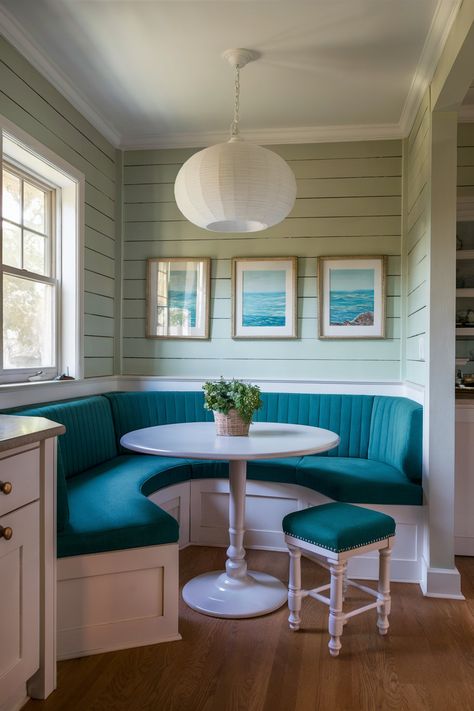 A bright and airy dining nook with teal upholstered seating, a white round table, and a large paper lantern hanging above Diy Corner Bench Kitchen Table, Banquet Seating Kitchen, Built In Seating Kitchen, Round Banquette Seating, Banquette Dimensions, Corner Bench Kitchen Table, Large Paper Lantern, Built In Banquette Seating, Nook Seating