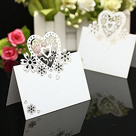 PRICES MAY VARY. paper Hollow heart and flower place card adds a modern touch to any table setting. Put the name of guests in the blank place if you need. Pre scored for easy folding and would look beautiful on any table Beautiful, quality place card Perfect for Wedding Party Decoration Material: Pearlized Cardstock Paper.  Color:White  Size:approx. 4.7*3.5"/12*9cm(L*W)  Package includes: 50 x Place Cards  Warm Tip: Dear buyer, Due to lighting effect,monitor's brightness,manual measurement and e Name Place Cards Wedding, Fest Temaer, Table Name, Christening Party, Wedding Name Cards, Wedding Party Table, Name Place Cards, Birthday Gift Cards, Wedding Party Invites