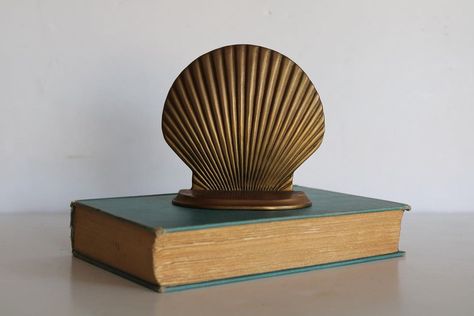 Brass Shell Bookend SOLD Dimensions Height: 4.5” Length: 4.75” Depth: 1.5” Comment or DM SOLD for the item you want or NEXT to be next in… | Instagram Brass Shell, Coastal Grandmother, Cash App, Message Me, Bookends, Shells, Brass, Instagram