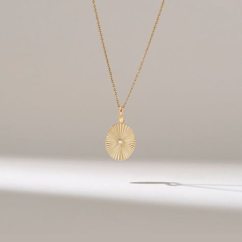 Minimalist Real Gold Pendant Necklaces for Birthday Gifts Features * Made to Order. * Gold KT: 14KT * Custom Gold Color: Yellow Gold * Charm 9.70mm x 11.17mm * Charm Thickness: 1.15mm * Diamond Color-Clarity: D-E-F color VVS clarity (excellent ideal cut) * Total Ctw: 0.03 ctw * Ready to Ship in 5-7 Business Days ✓ We care about the environment,the jewelry we cast is made with recycled gold. We source exclusively post-consumer material that is refined back to their pure elements to ensure that th Minimalist Diamond Necklace, Sun Pendant, Necklace Minimalist, Necklace Women, Recycled Gold, Diamond Fashion, Diamond Color, Gold Pendant Necklace, Polish Jewelry